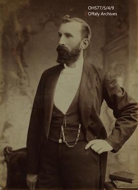Photograph of bearded man.